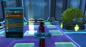SWTOR : Those green and purple squares on the ground are hooks. You click them to place items.
